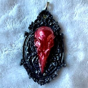 Handcrafted bird skull necklace